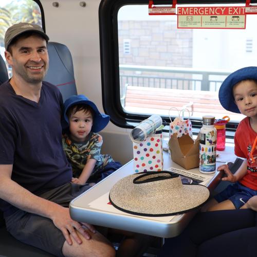 Smiling family aboard EMU