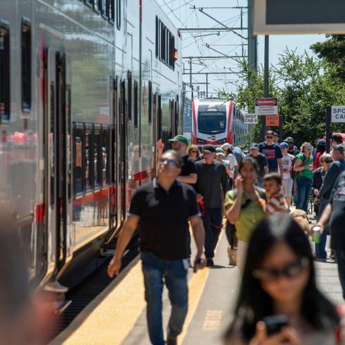 Crowd of passengers ready to board train