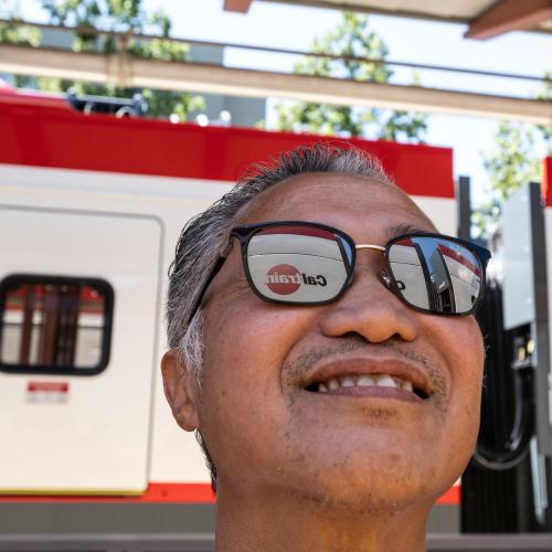 Onlooker with sunglasses at EMU unveiling