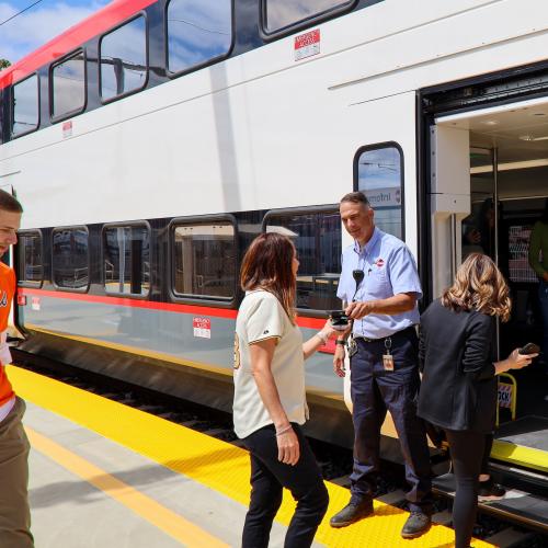 EMU Minishoot Giants Fans On Caltrain People riding Caltrain