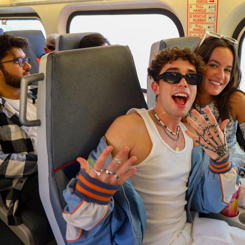 People riding train to Portola Fest