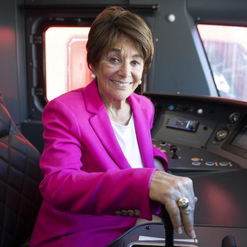 Congressmember Anna Eshoo in the cab of an electric train